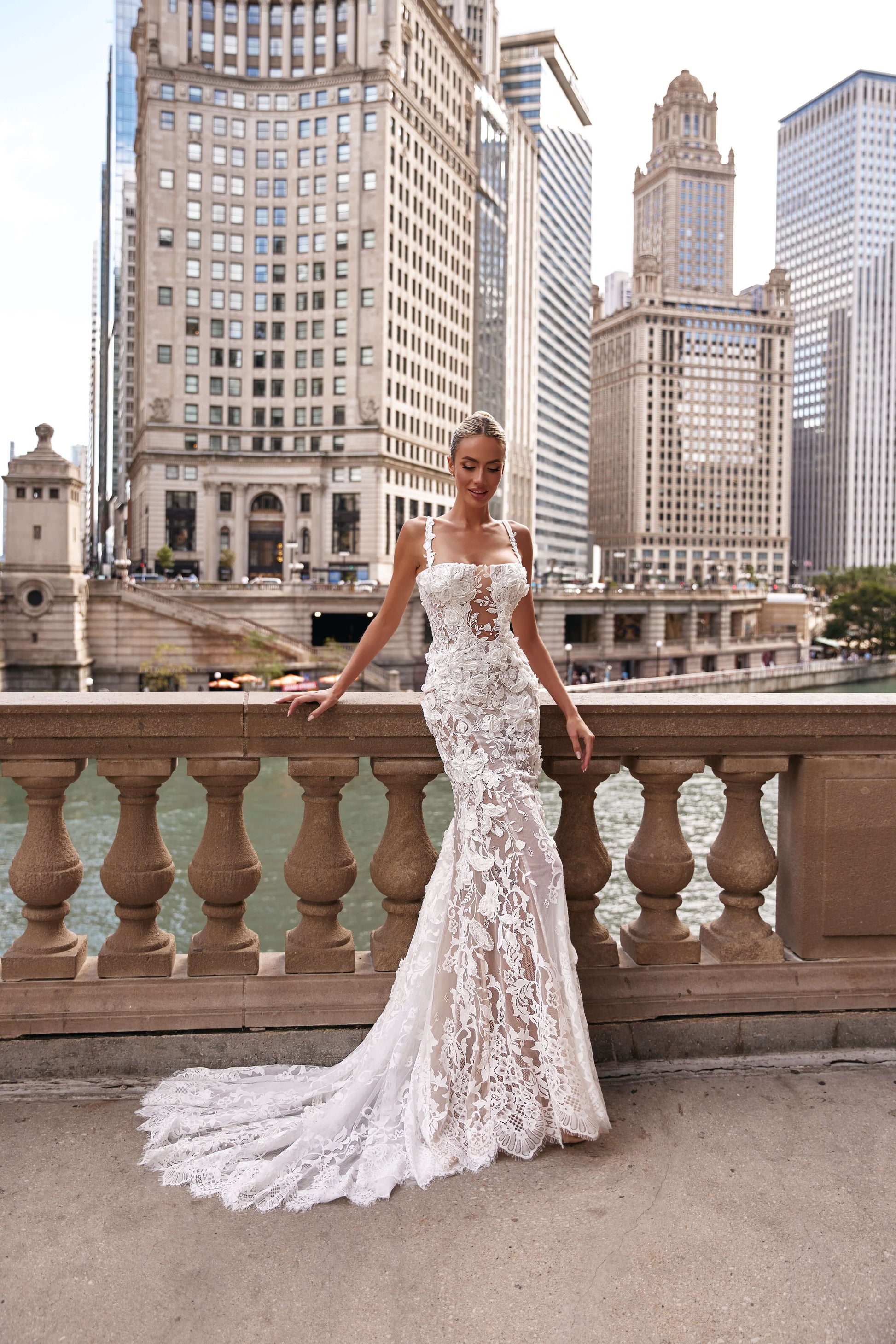 Chloe lined dress worn by a model in downtown Chicago, showcasing a romantic lace silhouette against a city backdrop.